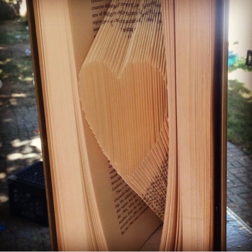 Handmade folded heart book art